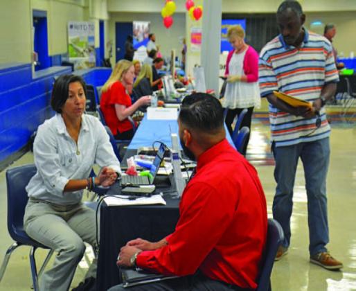 Employers will be set up at the Calvert Municipal Building on Wednesday to visit with job seekers and to answer questions about openings within their industries. FILE PHOTO