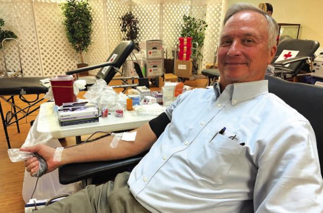 County Judge Randy Hoyer makes a donation of blood at last week’s drive. With his contribution, Hoyer has reached the one-gallon level as a donor. COURTESY PHOTO