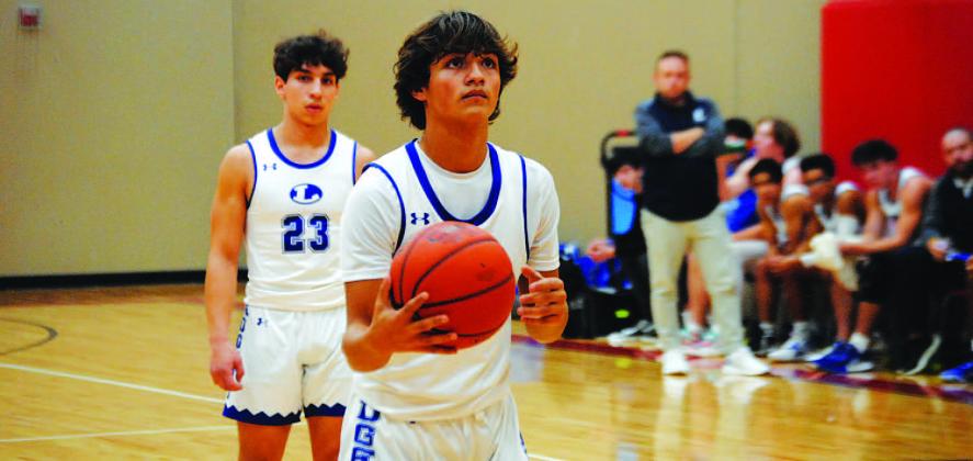 AJ Rosales is getting his first shot at varsity basketball this season, and so far he is taking advantage and playing well. HUNTER KING | DISPATCH RECORD
