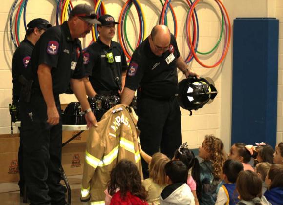 Lampasas firemen talk to Hanna Springs Elementary School students concerning fire safety in and around the home and what to do if a fire breaks out. JOYCESARAH MCCABE | DISPATCH RECORD