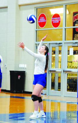 Emily Cain serves during the second set of Tuesday’s match. She is one of many seniors for the Lady Badgers. HUNTER KING | DISPATCH RECORD