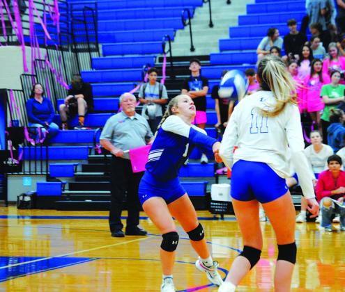 Bre Quarles reaches for a ball during the Pink Out game against Jarrell on Tuesday. HUNTER KING | DISPATCH RECORD