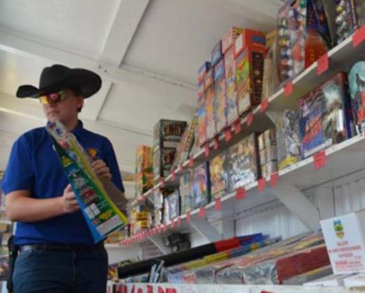 An American Fireworks employee stocks pyrotechnics before holiday sales. FILE PHOTO