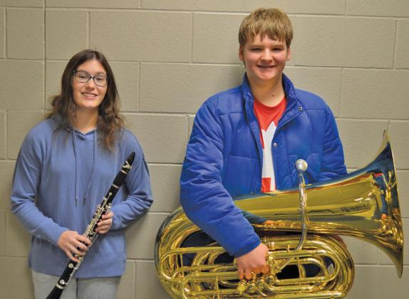 Madi Giffin and Alexander Thorne showcase their instruments. The pair are the first Badger Band members to achieve All-State honors in four years. Erick mitchell | dispatch record