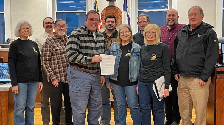Members of Lampasas Friends of the Night Sky gather with the Lampasas City Council for a photo to celebrate the resolution proclaiming February as Night Sky Awareness Month. courtesy photo | friends of the niight sky