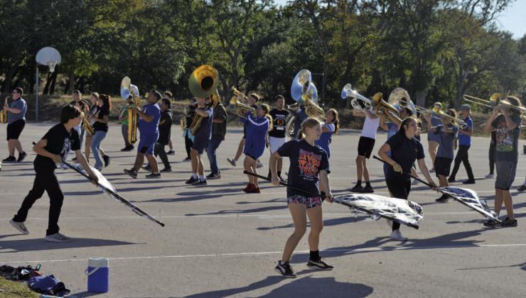 The Lampasas High School Badger Band goes through its preparations on Wednesday afternoon before heading to Saturday’s UIL 4A Area D Marching Band Contest in Pflugerville. ERICK MITCHELL | DISPATCH RECORD