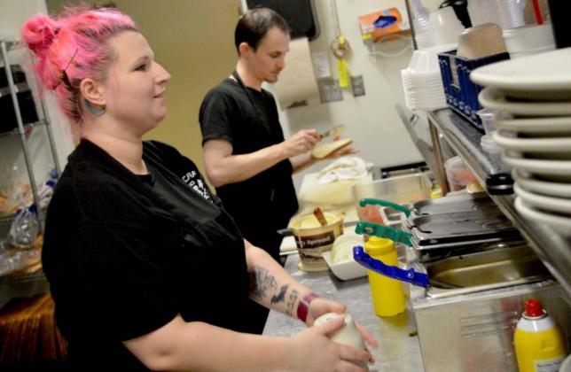 Faith Abrams and Marcus Lieber-Taylor work in Eve’s Cafe in downtown Lampasas, where they are recent hires. JEFF LOWE | DISPATCH RECORD