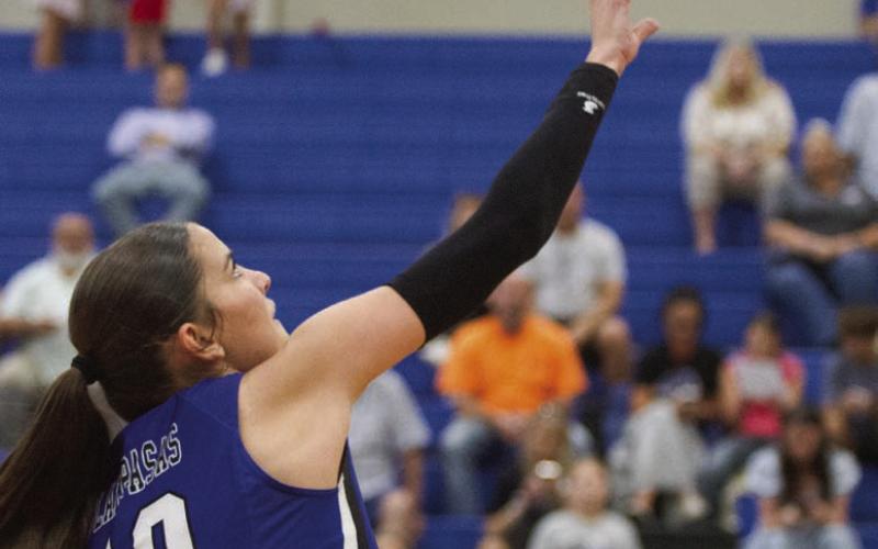 Ysabella Swain makes a play at the net in the Lady Badgers’ three-set victory over the Waco Lady Lions on Tuesday. ERICK MITCHELL | DISPATCH RECORD