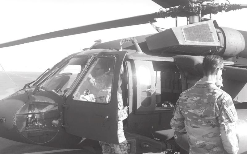 A Blackhawk helicopter is shown here. Flags flown from a military helicopter over Kuwait have been donated to Hanna Springs Elementary School. COURTESY PHOTO