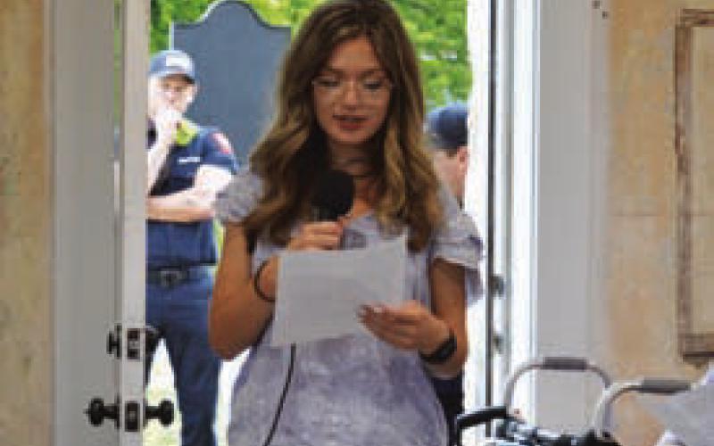 ERICK MITCHELL | DISPATCH RECORD Lampasas High School student Jessyn Ramos reads the Emancipation Proclamation signed by President Abraham Lincoln.