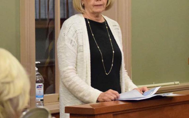 Central Counties Services Executive Director Johnnie Wardell speaks to the Lampasas County Commissioners Court on Monday about the services the non-profit mental health organization offers. Alexandria Randolph | Dispatch record