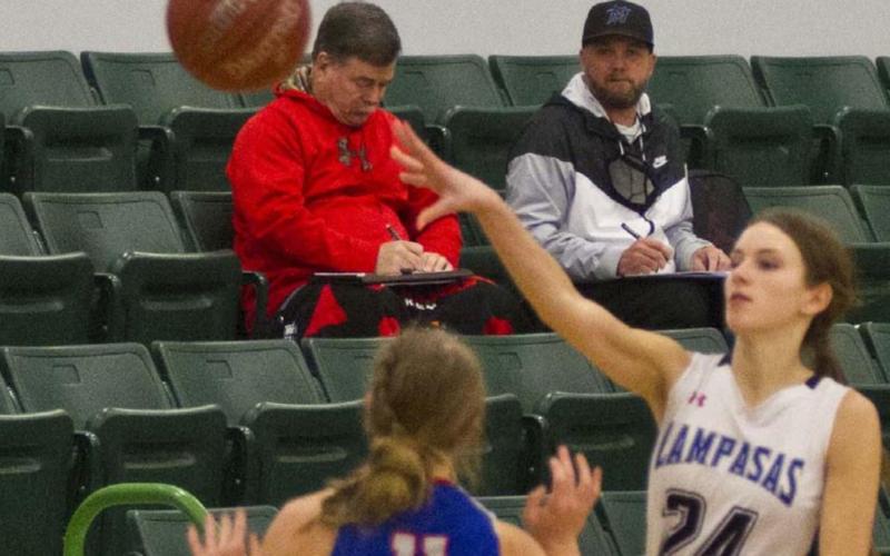 Addison McDonald passes the ball in her last game with the Lady Badgers