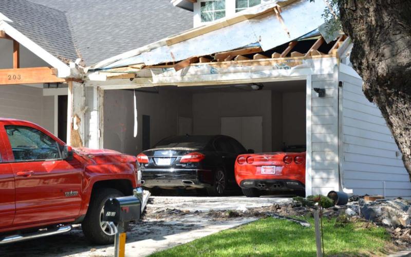 Damage was visible at 203 S. Howe St. over the weekend after a vehicle crashed into the house Saturday about 1:30 a.m. DAVID LOWE | DISPATCH RECORD