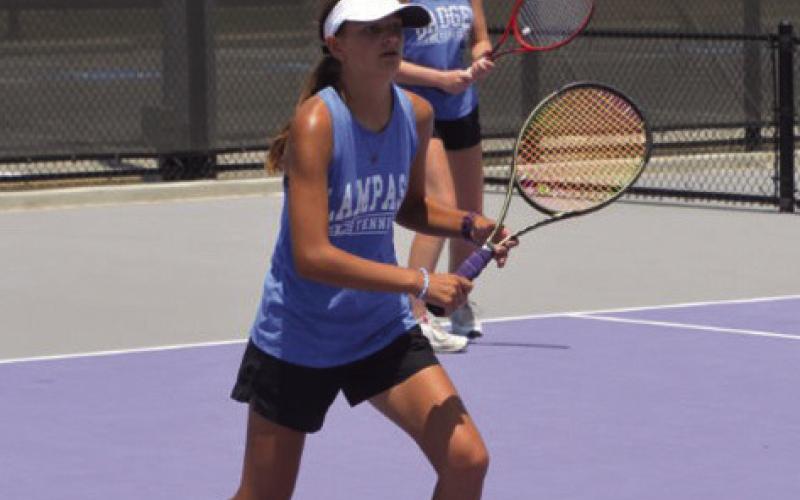 Madelynn White is back in action after her second-place state finish last year with sister Caroline White. White played doubles with Ellie Peiser on Friday. COURTESY PHOTO