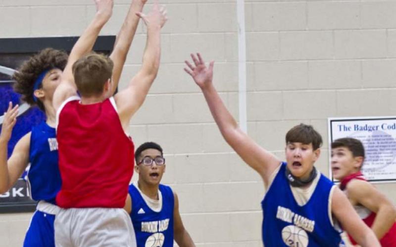 Badger defenders, left to right, Cameron Stokes, Isaiah Wintle and Henry Calvery compete in a scrimmage at home against Salado. JEFF LOWE | DISPATCH RECORD