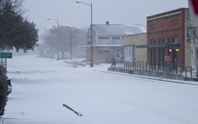East Fourth Street was a deserted scene during heavy snow on Valentine's Day afternoon.