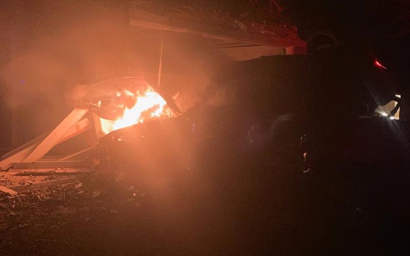 Wayne Hilgenberg sent the Dispatch Record this photo of the vehicle fire that he and neighbor Davis Keele extinguished shortly after a 2019 Ford Mustang crashed into a house at 203 S. Howe St. early Saturday morning.