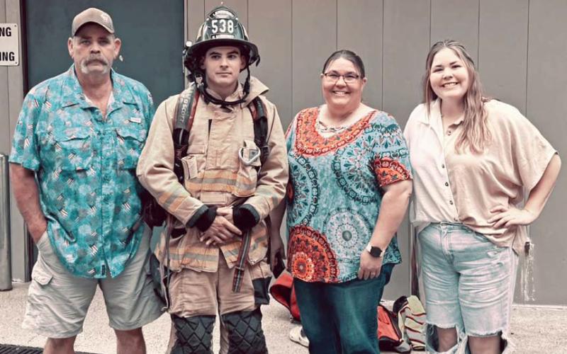 courtesy photo The Sanguinet family poses for a photo on Sept. 11 while supporting Hunter Sanguinet at his memorial climb in San Antonio. From left to right are Andy, Hunter, Kelli and Caitlyn Sanguinet.