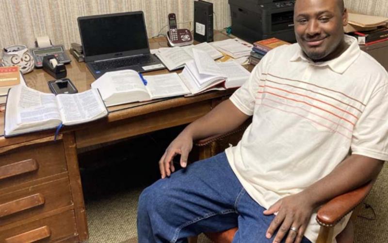 Minister Jaelyn Downey is shown in his office at the Lometa Church of Christ. He graduated from the Brown Trail School of Preaching and joined the Lometa congregation in December. MADELEINE MILLER | DISPATCH RECORD