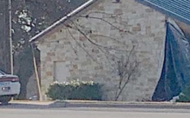 A tarp covers the part of Kempner City Hall that was hit Friday at 2:12 a.m. by a sport-utility vehicle. After the crash, the SUV’s operator was arrested on a charge of driving while intoxicated. LEVI BURNEY | COURTESY PHOTO
