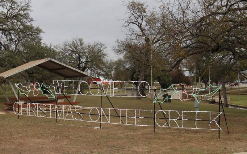 The city parks department quickly repaired the electrical damage done to the Welcome To Christmas On The Creek sign. JOYCESARAH MCCABE | DISPATCH RECORD