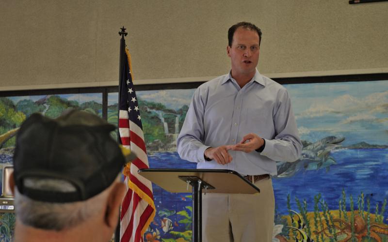 U.S. Rep. August Pfluger (R-San Angelo) speaks to those in attendance at his first town hall meeting in Lampasas. The gathering was held Thursday at the former middle school cafeteria. ERICK MITCHELL | DISPATCH RECORD