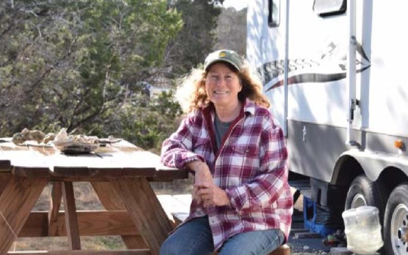 Lisa Love enjoys the natural setting her RV lifestyle provides. ALEXANDRIA RANDOLPH | DISPATCH RECORD