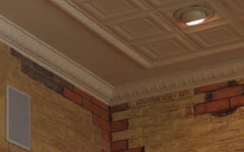 Inside the Santa Fe Depot’s passenger portion, exposed brick walls meet a classic pressed-tin ceiling with ornate crown molding. ERICK MITCHELL | DISPATCH RECORD