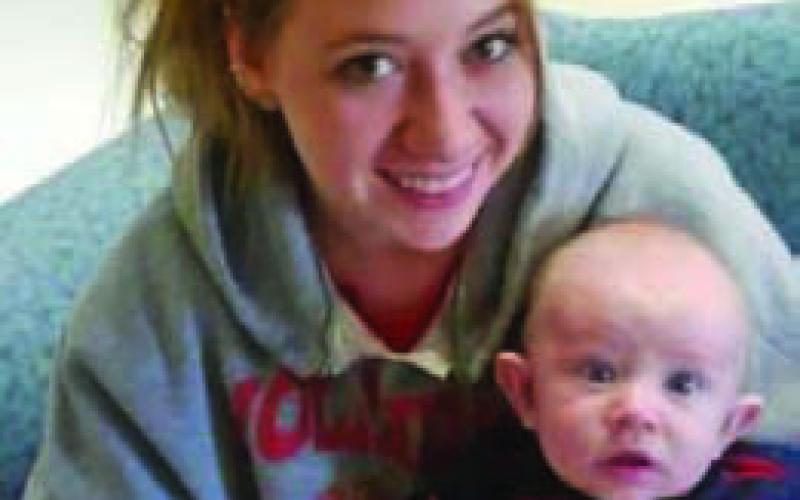 Corinna Lee Ann Nadine Pope was killed Nov. 17 in a pedestrian-vehicle collision in Coryell County. Her family supplied this photo of Pope with her son when he was a baby. COURTESY PHOTO