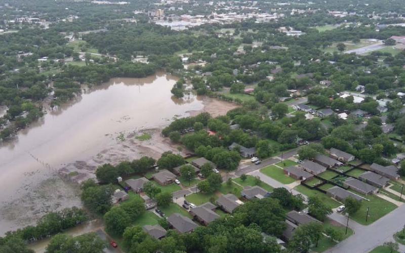 This drone photo shared by a Lampasas resident shows extensive flooding in the area of the Gibson Branch of the Lampasas River on the morning of July 5. More flood photos are inside on page 7. MICHEAL HAVENS | COURTESY PHOTO