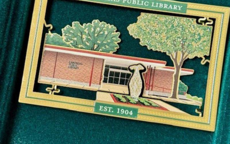 These specially designed ornaments feature a cut-out image of the entrance of Lampasas Public Library. Ornaments are on sale while supplies last. courTesy photo | lampasas public library