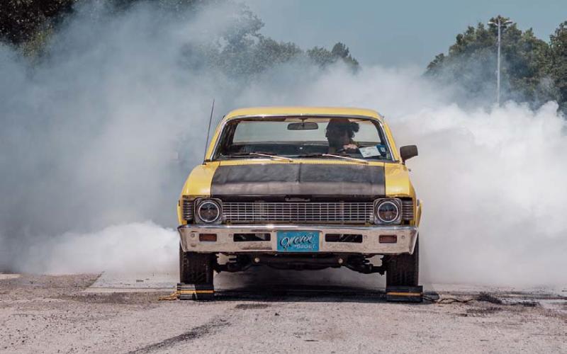 Smoke filled the air during the burnout competition as seven vehicles showed off for the crowd. ADAM BARRIOS | DISPATCH RECORD