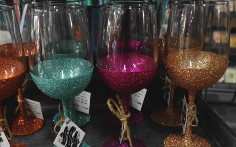 These glittery wine glasses are made in-house at the Jessie Dallas Boutique in Kempner. MADELEINE MILLER | DISPATCH RECORD