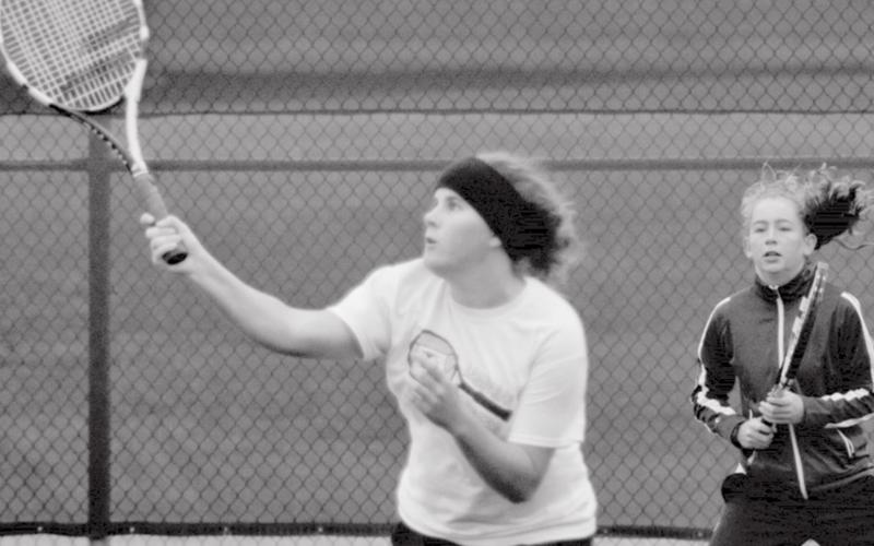 Abby Valdez, right, earned first-team all-district in tennis singles, and second-team in doubles, with Kailr Clements, shown hitting the ball. JEFF LOWE | DISPATCH RECORD