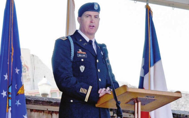 Col. John “Mike” Wallace, deputy commander of the Texas National Guard 36 th Infantry Division, thanked veterans and military families for their service to the United States. MADELEINE MILLER | DISPATCH RECORD