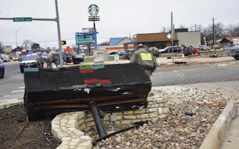 DISPATCH RECORD This electronic sign at First Texas Bank’s motor facility was flattened by a southbound vehicle Sunday afternoon as the vehicle was being pursued by a Texas Department of Public Safety trooper. The driver fleeing from the DPS did not survive the crash at Key and North avenues.