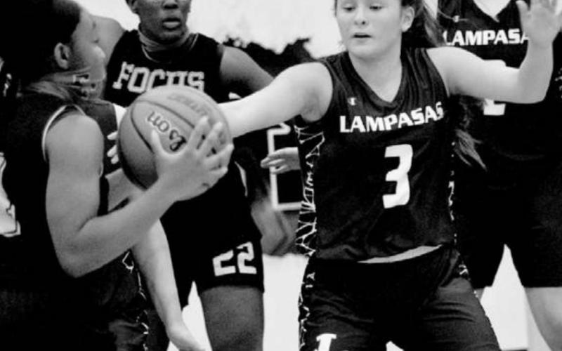 Kharis Castañeda (3) guards an opposing player in the Lady Badgers’ home basketball scrimmage on Tuesday. JEFF LOWE | DISPATCH RECORD
