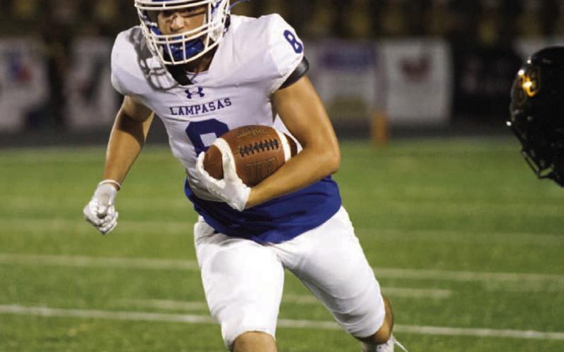 Wide receiver Austin Puda picks up a short gain after catching a 5-yard pass from quarterback Ross Kothmann. ANA SOFIA MEYER | DISPATCH RECORD