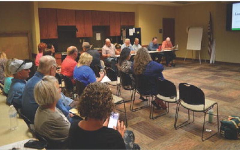 Residents await the opening of Wednesday’s public hearings on the 2023-2024 county tax rate and budget. ERICK MITCHELL | DISPATCH RECORD