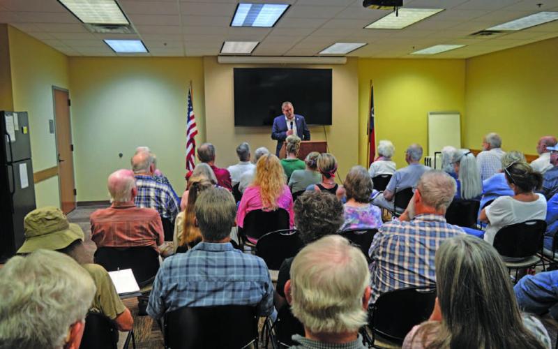 A standing-room-only audience filled the conference room at the Lampasas County Office Building Thursday evening to hear District 68 State Rep. David Spiller describe action taken during the recently completed regular legislative session. ERICK MITCHELL | DISPATCH RECORD