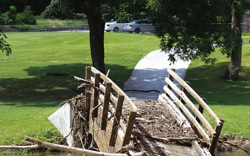 The cart path at Hole No. 6 on the Hancock Park Golf Course was destroyed by floodwaters last July. The Lampasas City Council will seek an engineering study before repairs are undertaken on the structure. FILE PHOTO