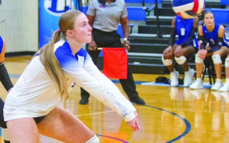 Junior libero Kari Kepler receives service in one of the Lady Badgers’ early-season matches. Kepler has become a six rotation player for coach Ali Tippie this season, taking on the leadership of her position. ANA SOFIA MEYERL | DISPATCH RECORD