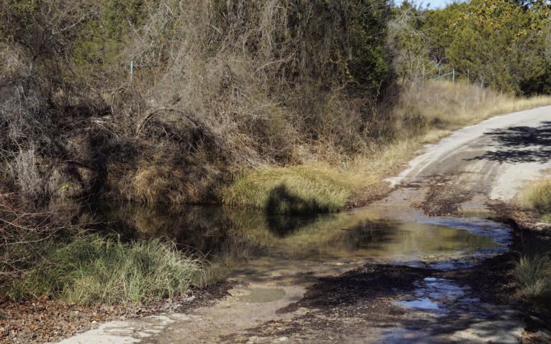 This low-water crossing is in need of repairs along County Road 2207 at Lucy Creek and will be funded by FEMA. ERICK MITCHELL | DISPATCH RECORD