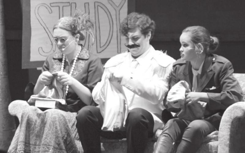 Performers Abby Taylor (at left) as Mrs. Peacock, Cole Wheeler as Col. Mustard and Kelsea Moyer as Ms. Green react to the weapons in their gift bags in the play “Clue.” CHRIS YBARRA | DISPATCH RECORD