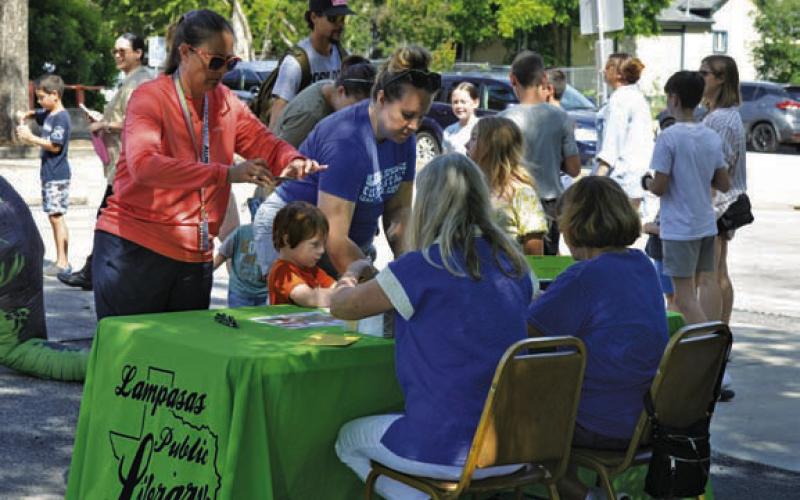 Parents were busy signing up their youngsters for the Lampasas Public Library’s Summer Reading program that caters to children ages 3-10, plus teens ages 11-17. A reading program also is available for adults ages 18 and up. ERICK MITCHELL | DISPATCH RECORD