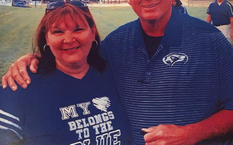 COURTESY PHOTO Burks poses for a photo with his wife, Tammy Burks, who teaches at Kline Whitis Elementary School.