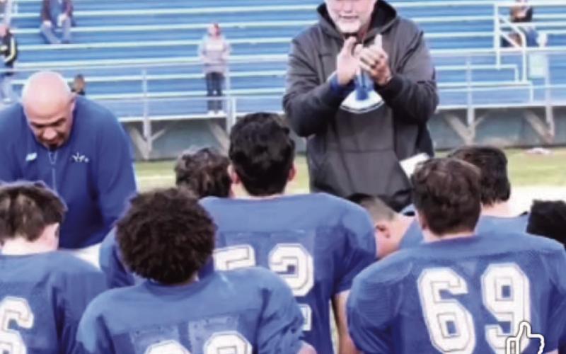 COURTESY PHOTO Burks coaches some middle school athletes. He was the LMS athletic coordinator for 26 years.