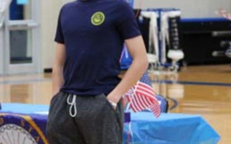 Senior Adam Arthurs thanks his friends and family for their support of his enlistment into the U.S. Navy. CHRIS YBARRA | DISPATCH RECORD