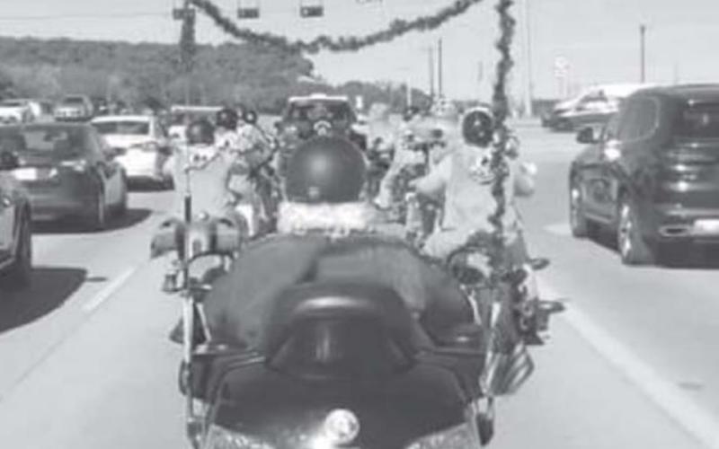 The Silverbacks Motorcycle Club is pictured during its 2019 Santa &amp;amp; Reindeer Ride. MADELEINE MILLER | DISPATCH RECORD