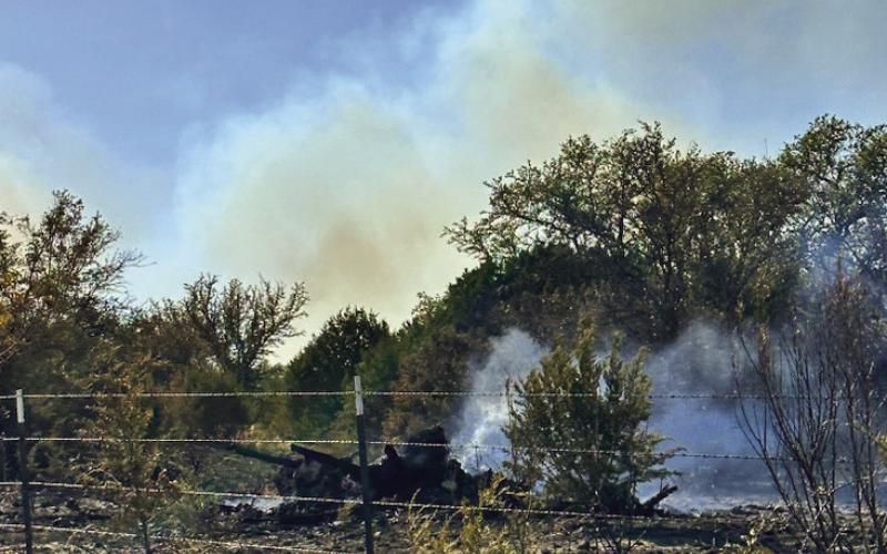 FILE PHOTO Smoke from a past wildfire is shown. Lampasas County remains under a burn ban.